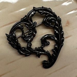 Interesting vintage dark silver retro pin